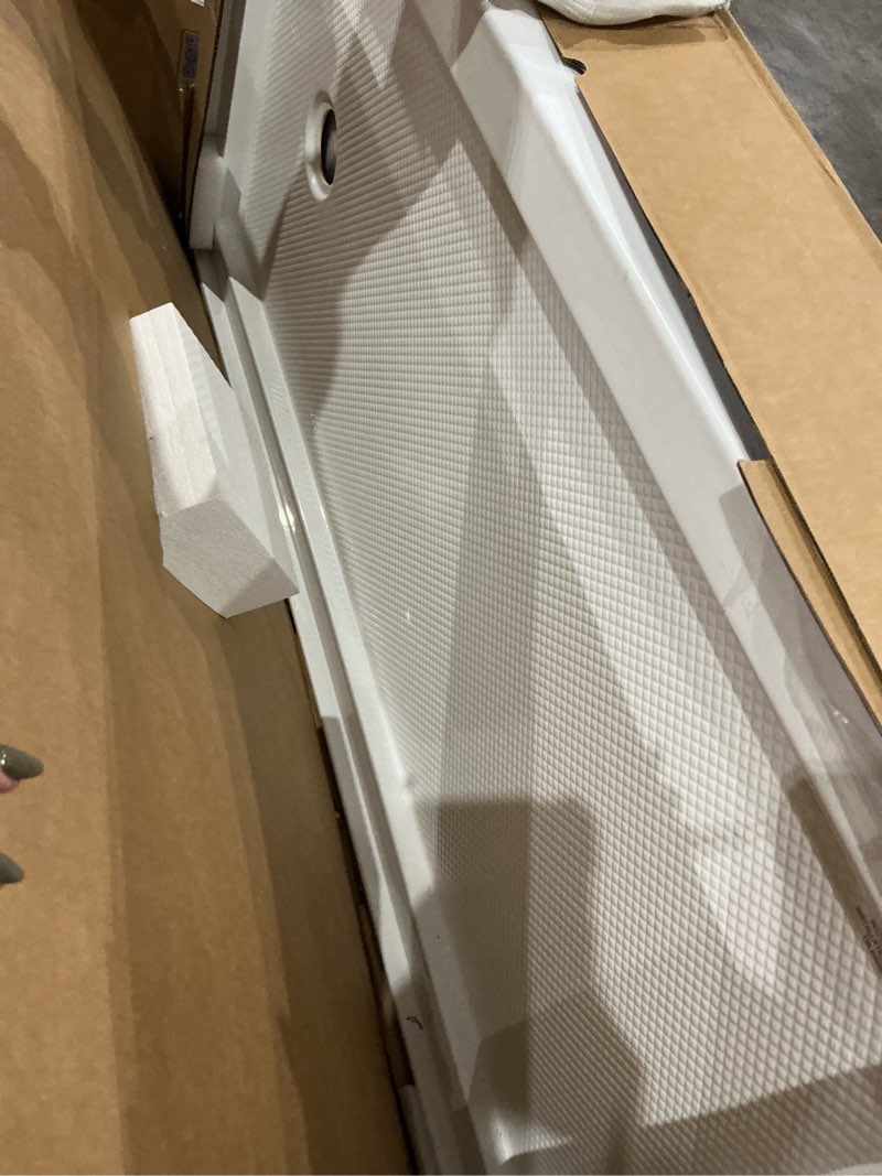 Condition photo showing Good Condition for dreamline slimline 30 in. d x 60 in. w x 2 3/4 in. h right drain single threshold shower base in white, dlt-1130602