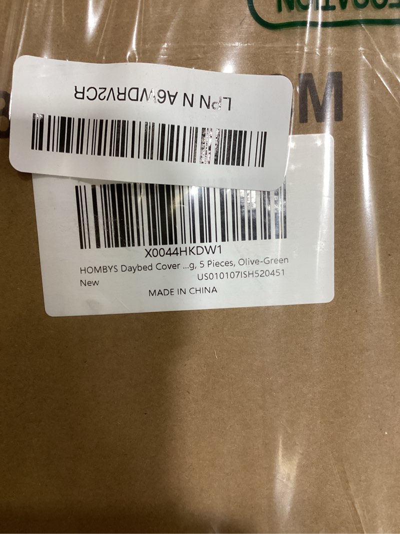 Condition photo showing New/Like New for Olive green daybed cover