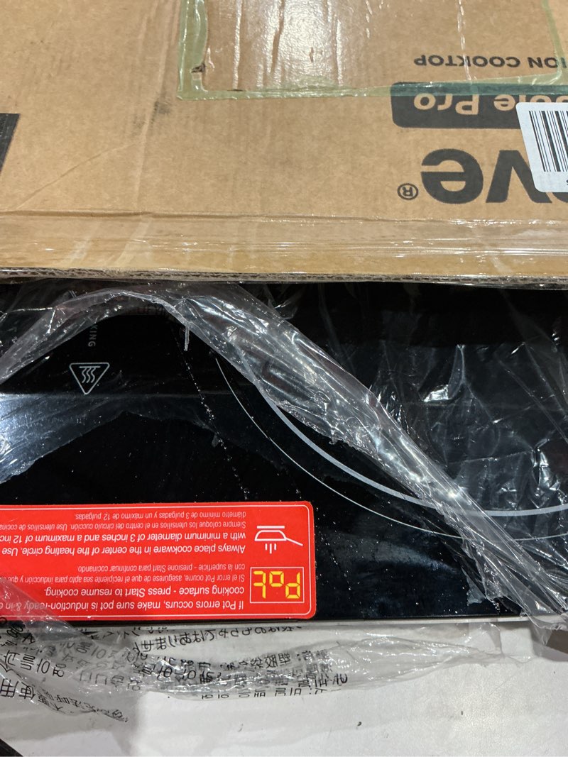 Condition photo showing As Is for nuwave double pro cooktop induction countertop burner, portable, 900/1500/1800w with dynamic watt technology, 50°f to 575°f, 8” heating coil, shatter-proof ceramic glass, seamless imd touch panel double cooktop