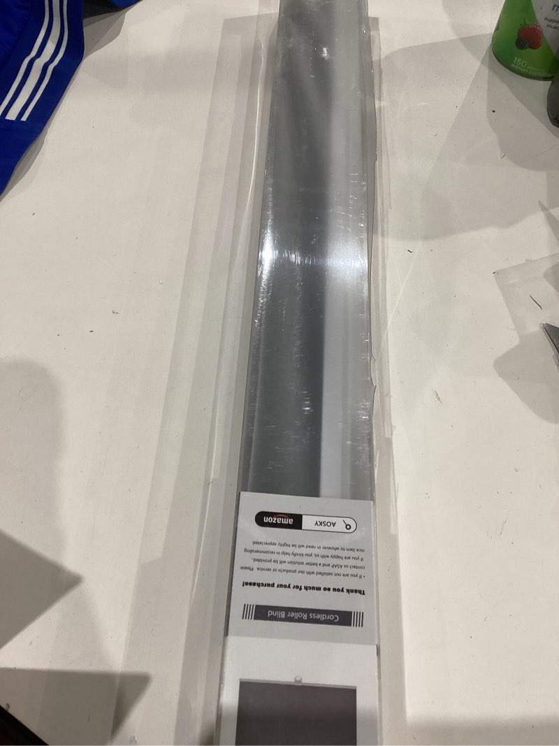 Condition photo showing As Is for AOSKY Cordless Roller Shades Blackout Blinds for Windows Room Darkening Rolled Up Shades with Spring System, UV Protection Window Shades Door Blinds for Home and Office (25" W x 72" H, Black) 25"W x 72"H Black