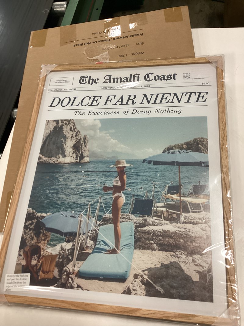 Condition photo showing Good Condition for iHery Natural OAK Wood Newspaper Trendy Framed Wall Art, Large Beige 16x20 in Dolce Far Niente Vintage Headline Canvas Wall Art, La Dolce Vita Italian Summer Bedroom Wall Decor Living Room 1Pack OAK Framed Dolce Far Niente 20"L x 16"W