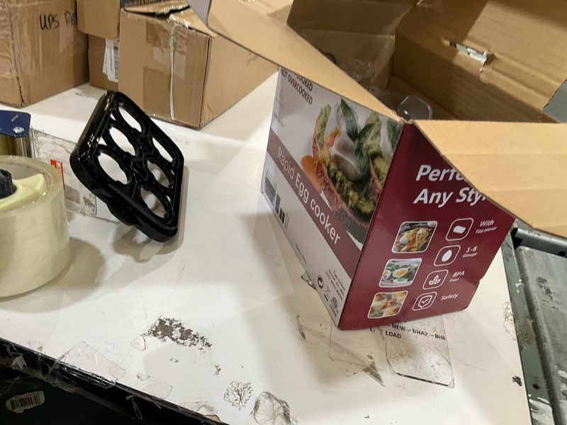 Condition photo showing As Is for rapid egg cooker