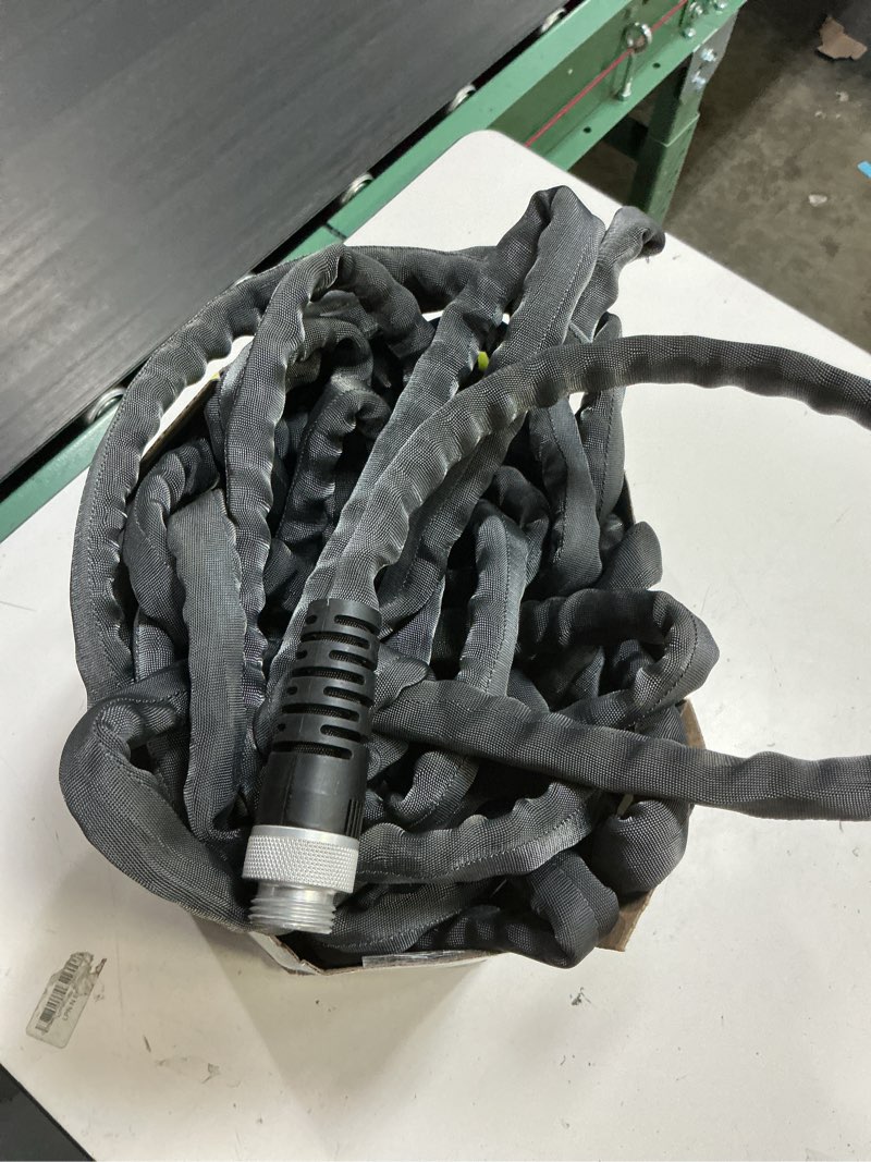 Condition photo showing As Is for zero-g teknor apex 5/8-in x 100-ft premium-duty kink free woven gray hose