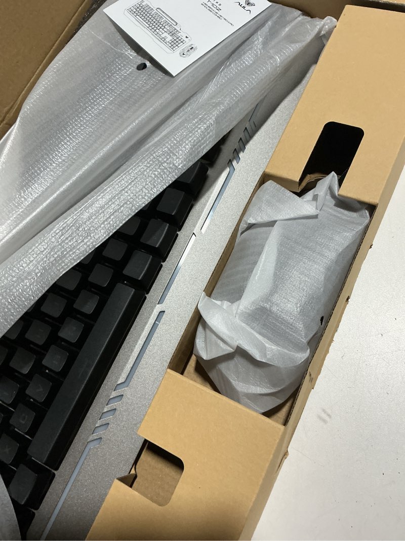 Condition photo showing As Is for AULA Keyboard, T102 104 Keys Gaming Keyboard and Mouse Combo with RGB Backlit Number Pad, All-Metal Panel Waterproof Light Up PC Keyboard,USB Wired Computer Keyboards Gaming for Win XP/7/8/10 PC Gamer Black Keycaps + Silver Panel