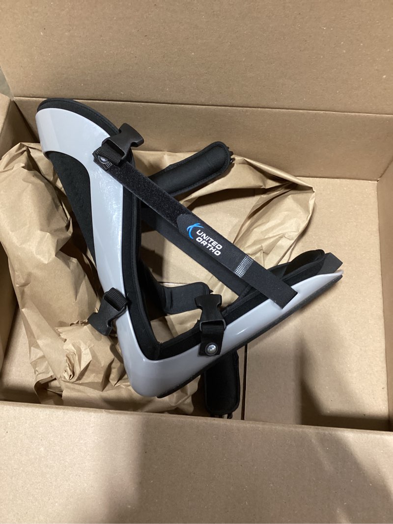 Condition photo showing As Is for leg support brace