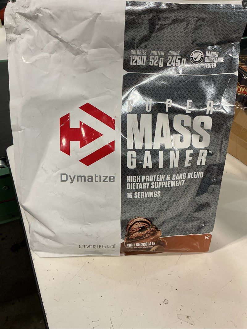 Condition photo showing New/Like New for (exp 04/2027)dymatize super mass gainer protein powder, rich chocolate, 52g protein, 1g creatine, 1280 calories,