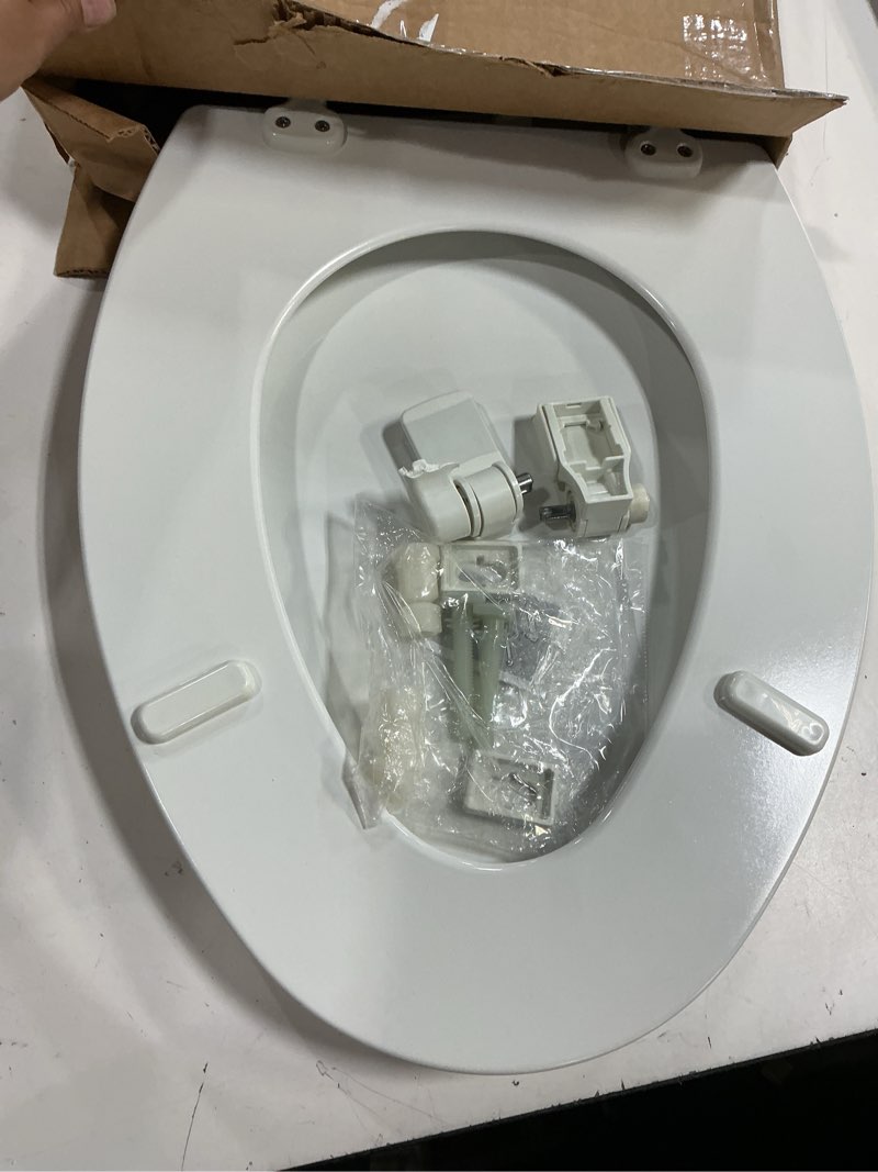 Condition photo showing As Is for mayfair cassel slow close toilet seat, easy clean, non slip premium wood seat, easy install, made in usa, elongated, white elongated 1 - toilet seat
