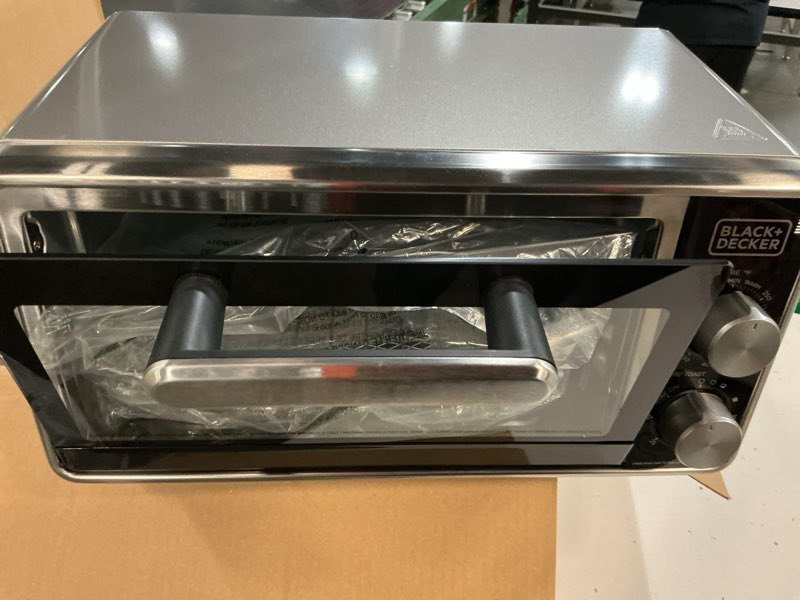 Condition photo showing As Is for black+decker crisp ‘n bake pro stainless steel 4-slice air fryer toaster oven