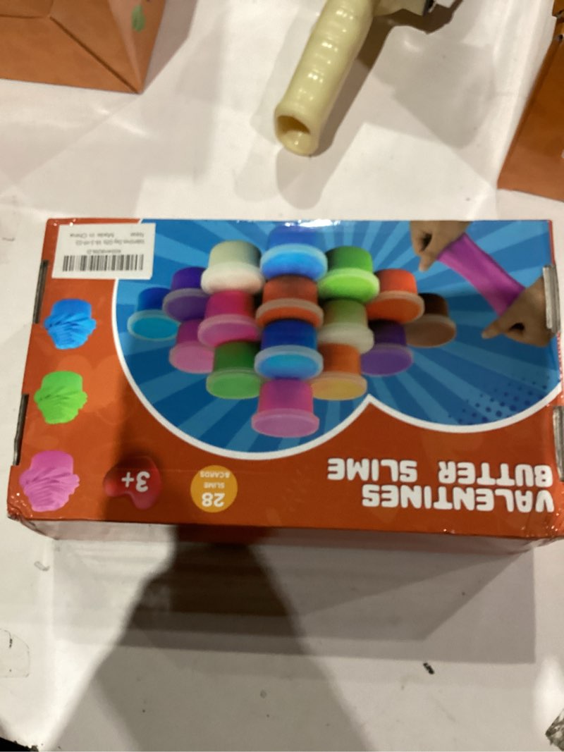 Condition photo showing New/Like New for Valentines Day Gifts for Kids, 28 Pack Valentines Butter Slime Toys Valentines Cards Stress Relief Fidget Slime Toy Valentines Exchange Gifts for Kids School Classroom Valentines Party Favors