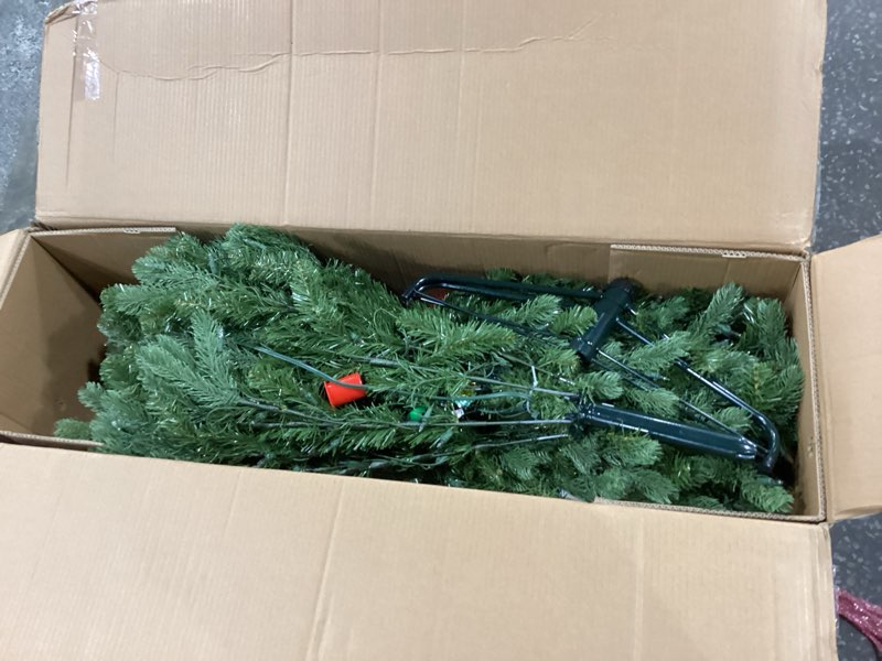 Condition photo showing New/Like New for National Tree Company 6.5 ft Pre-Lit Downswept Douglas Fir Artificial Christmas Tree, 650 Clear Lights, 1,227 Tips, Includes Stand, Green 6ft 6in Christmas Tree