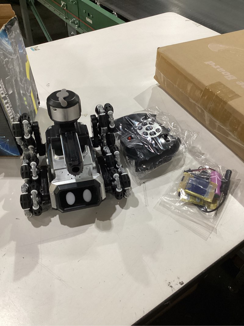 Condition photo showing As Is for Godboat Robot Dog - Smart Toys for Kids with Music & LED Eyes, 2.4GHZ RC Car, 8-Wheel Stunt, 9+ Lifelike Actions and Water-Shooting, Age 3 4 5 6 7 8 Year Old Boys Girls Christmas & Birthday Gifts 2026 Black