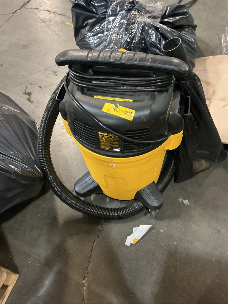 Condition photo showing As Is for dewalt 6-gallon 4 hp corded wet/dry shop vacuum with accessories included
