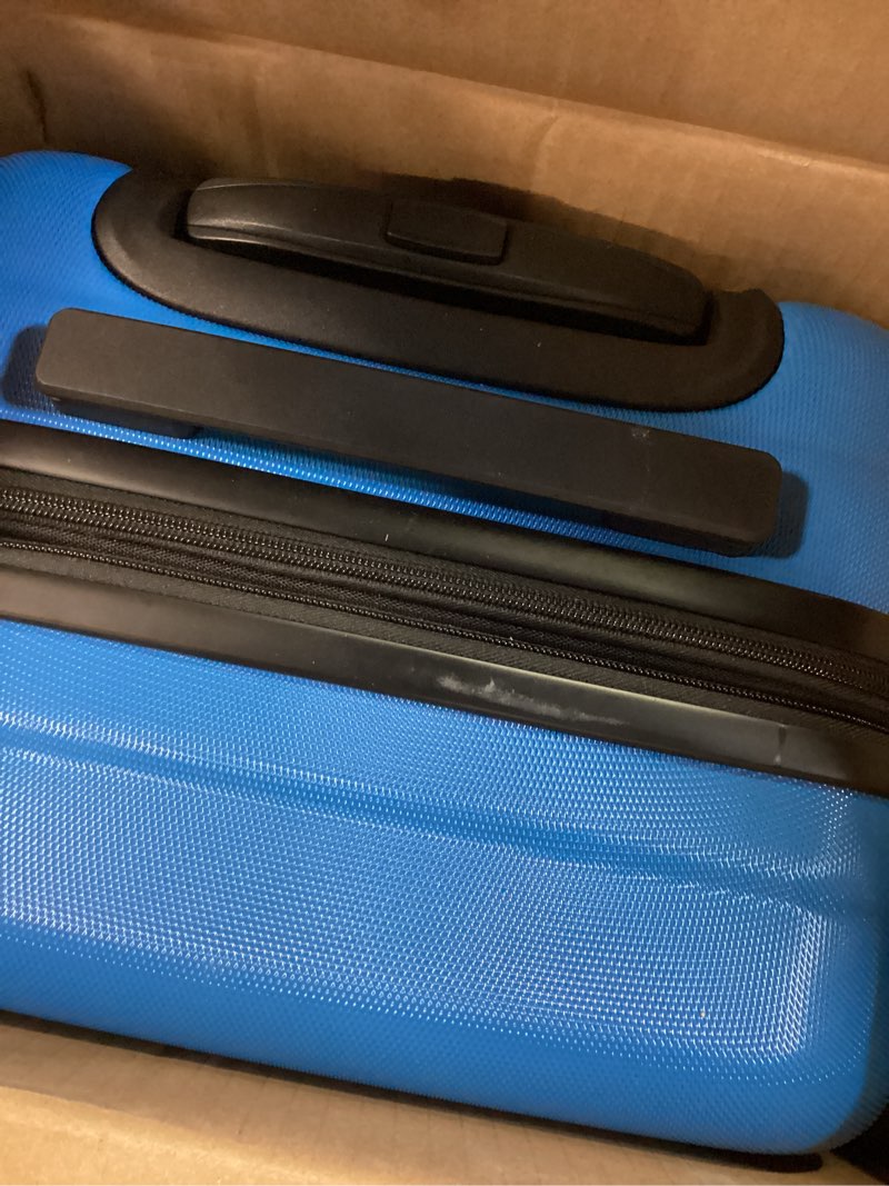 Condition photo showing Good Condition for Amazon Basics 21" Hardside Carry-On Luggage, Hardshell Suitcase With Wheels, Expandable For Up to 25% More Space, With Scratch-Resistant Surface, Four Multi-directional Wheels, Light Blue Light Blue Carry-On