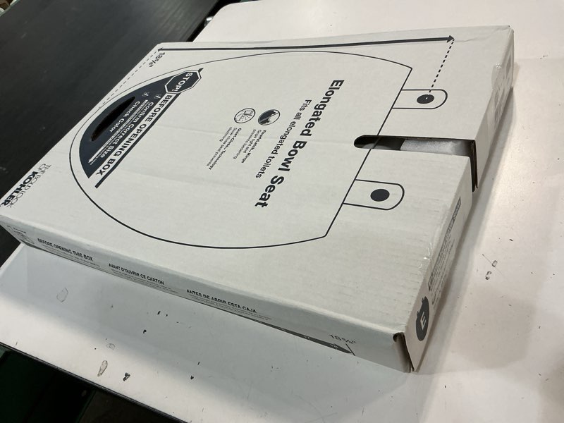 Condition photo showing New/Like New for kohler k-27331-0 glissade readylatch quiet close elongated toilet seat, white, grip-tight hardware, quiet close lid prevents slamming white elongated