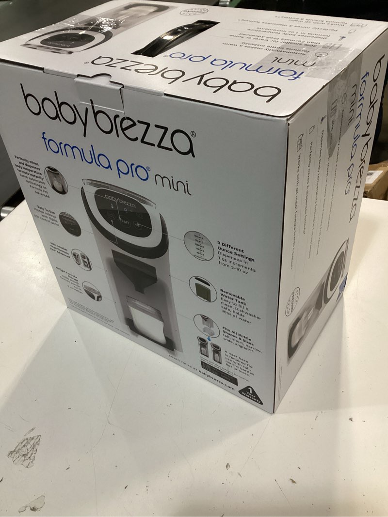 Condition photo showing New/Like New for baby brezza new and improved formula pro advanced formula dispenser machine - automatically mix a warm formula bottle instantly - easily make bottle with automatic powder blending, white formula pro advanced dispenser