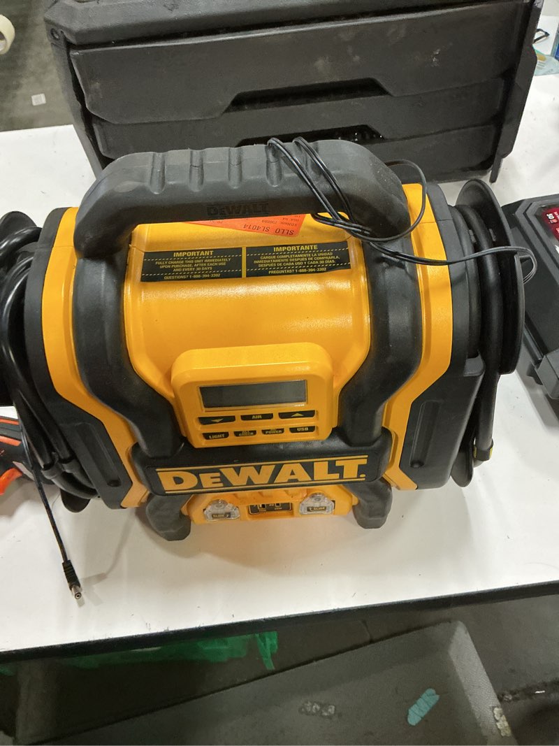 Condition photo showing As Is for dewalt dxaeps14 portable jump starter 2000 peak amp w/compressor 