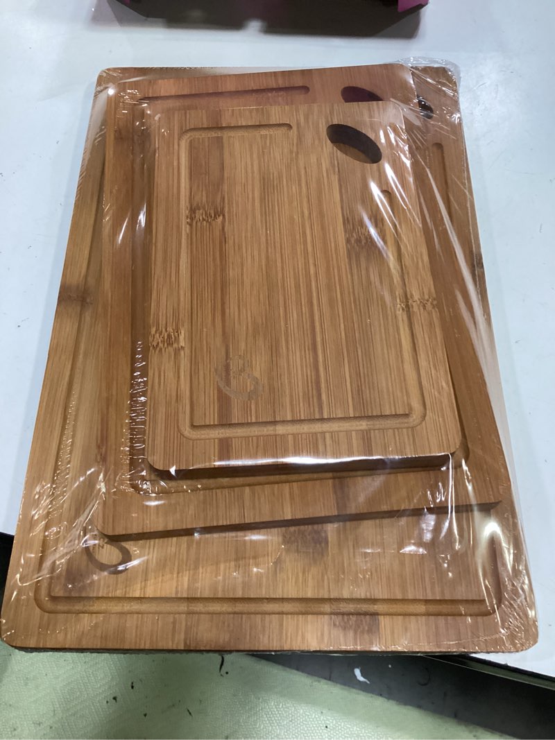 Condition photo showing New/Like New for wood cutting boards set of 3 – non-toxic bamboo chopping boards for kitchen with deep juice grooves – durable, eco-friendly wooden serving boards for meat, vegetables & fruit