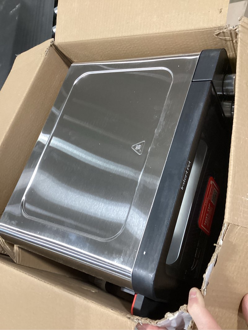 Condition photo showing As Is for Instant Pot No Preheat Required* 4-Slice Air Fryer Toaster Oven with InstantHeat Technology, 7-in-1, Air Fry, Bake, Toast, Roast, Broil, Warm, and Make Pizza 4-Slice Toaster Oven