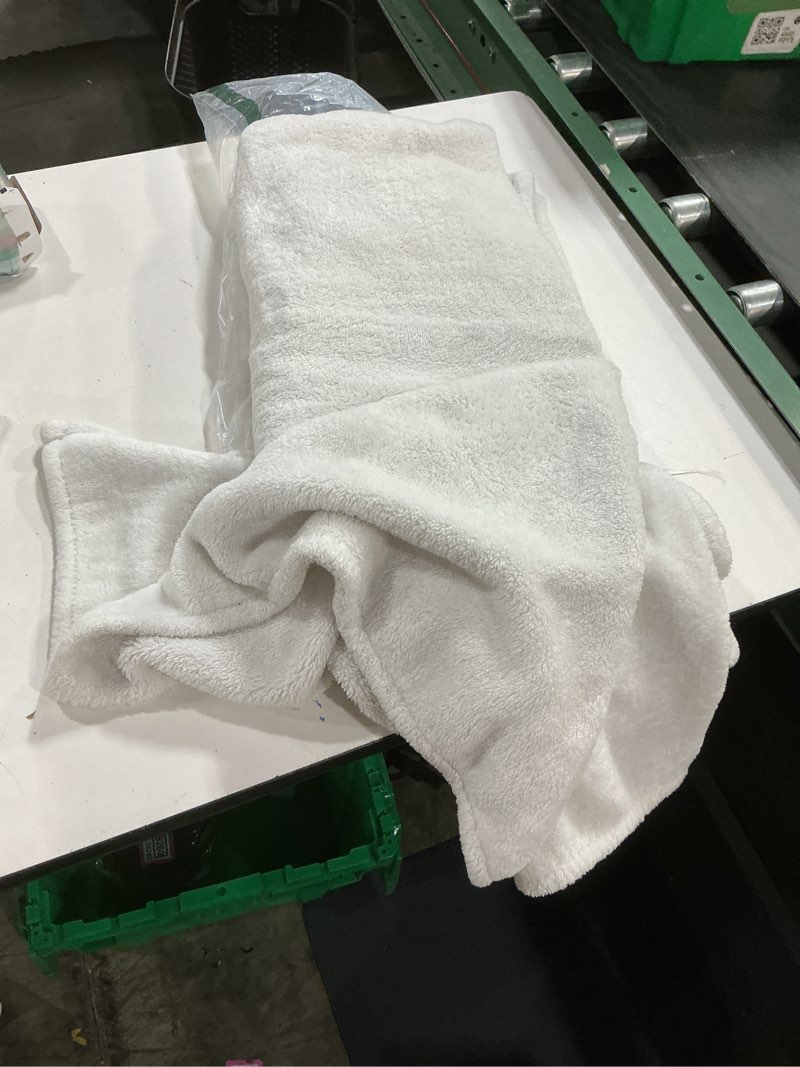 Condition photo showing As Is for white blanket 