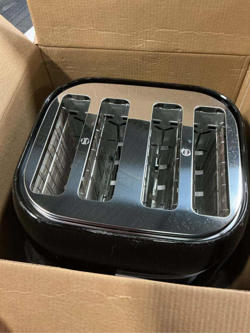 Condition photo showing As Is for BLACK+DECKER 4-Slice Toaster, Extra Wide Slots, 7 Shade Settings, 1400 Watts, Frozen and Bagel Buttons, Toast Shade Selector, Extra Lift 4-Slice Black