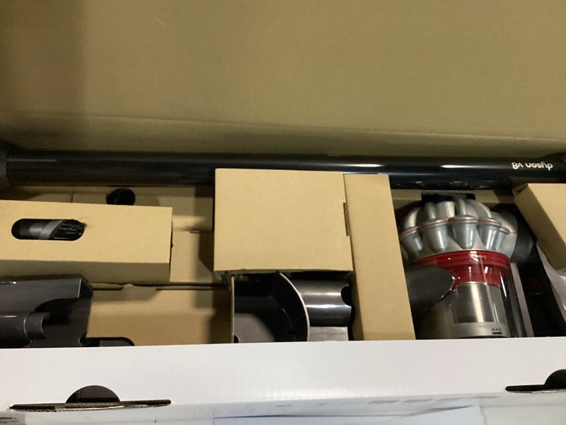 Condition photo showing As Is for dyson v8 cordless stick vacuum cleaner