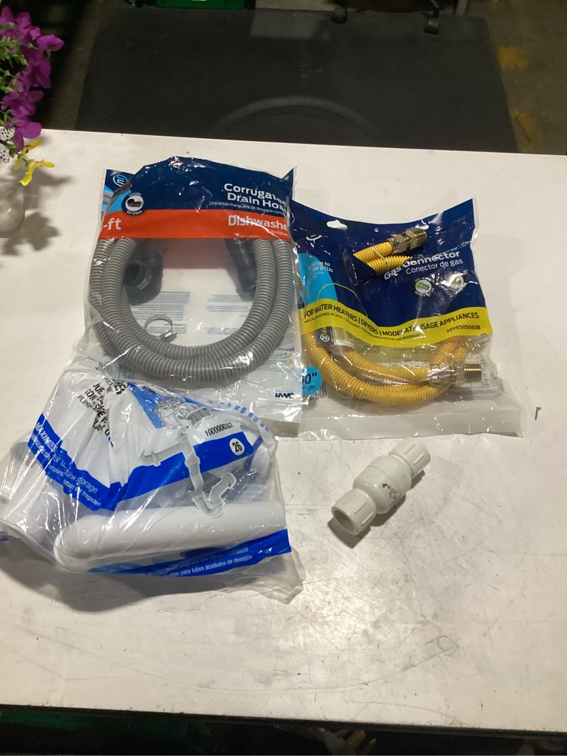 Condition photo showing As Is for assorted kitchen and appliance hoses and pipes