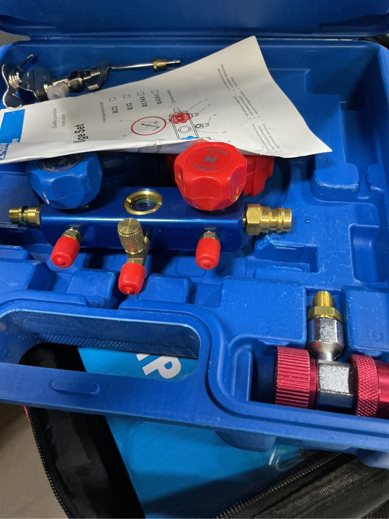 Condition photo showing As Is for 3cfm 14hp air vacuum pump and r134a r12 r22 r410a ac manifold gauge set kit for hvac air conditioning refrigeration recharging with carrying tote