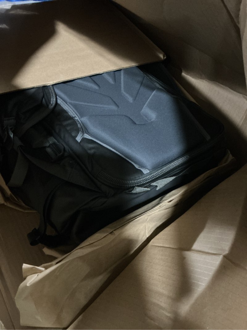 Condition photo showing As Is for shimoda action x50 v2 starter kit, outdoor photography adventure backpack fits gripped mirrorless and dslr cameras, includes medium dslr core unit, expandable rolltop, 16" laptop sleeve, black black starter kit - x50