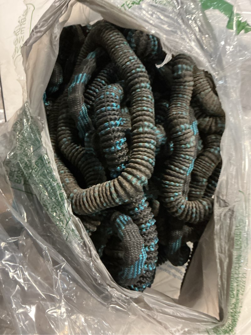 Condition photo showing As Is for flexi hose expandable garden hose with 8 function nozzle, 50ft - lightweight retractable garden hose, water hose - no-kink flexibility, 3/4 inch solid brass fittings and double latex core