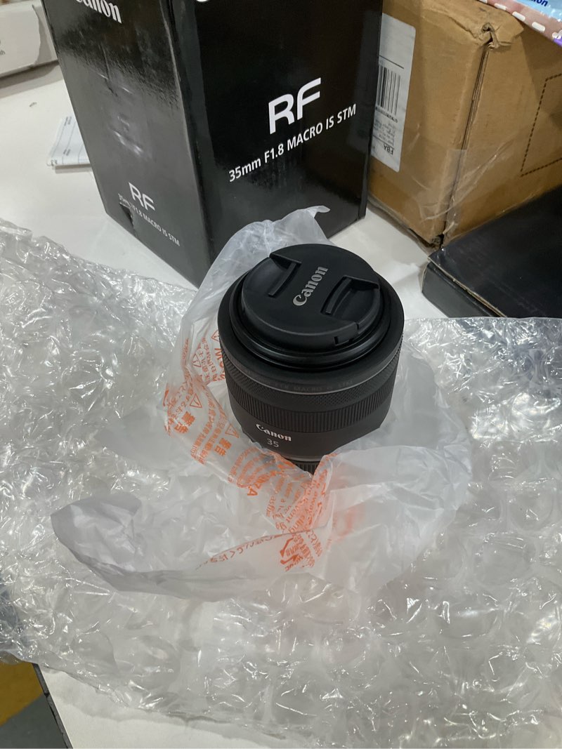 Condition photo showing New/Like New for Canon RF35mm F1.8 is Macro STM Lens, Black