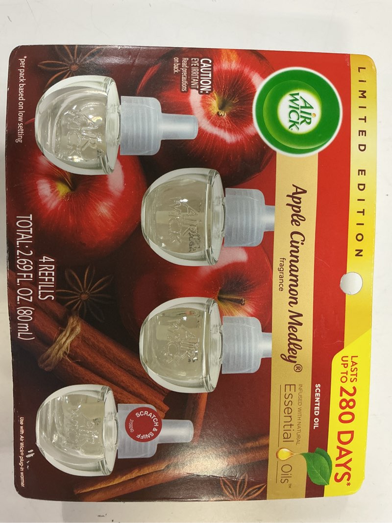 Condition photo showing New/Like New for air wick® plug in scented oil air freshener refill pack - 4 count oil refill apple cinnamon medley, essential oils