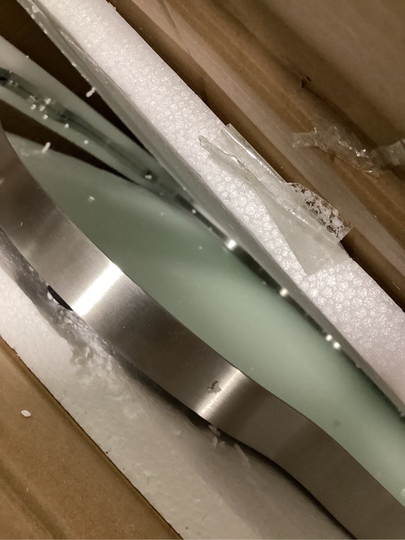 Condition photo showing Good Condition for ANDY STAR Brushed Nickel Bathroom Mirror, 24x36 Inch Silver Asymmetrical Wall Mirror, Oval Bathroom Vanity Mirror, Unique Irregular Wall Mirror with Sophisticated Curved Design Brushed Nickel 36"L x 24"W