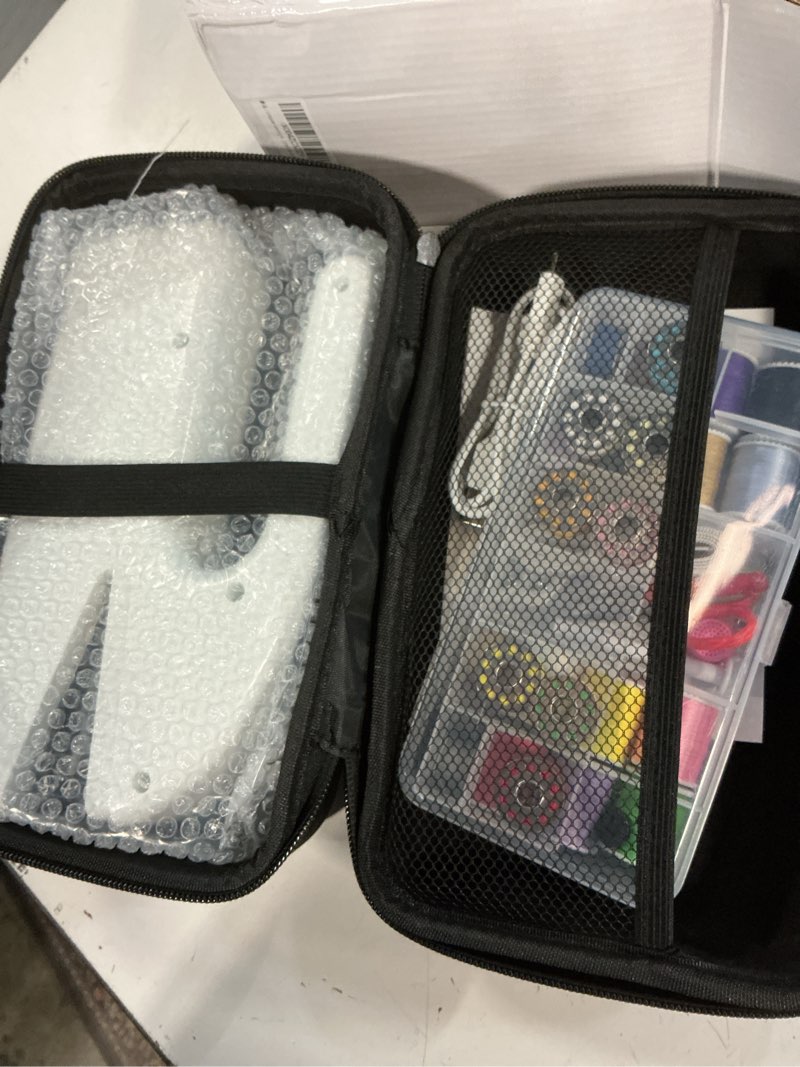 Condition photo showing Good Condition for unique sewing experience: handheld sewing machine with storage box, portable package,mini sewing machine for travel, including various accessories and tools white