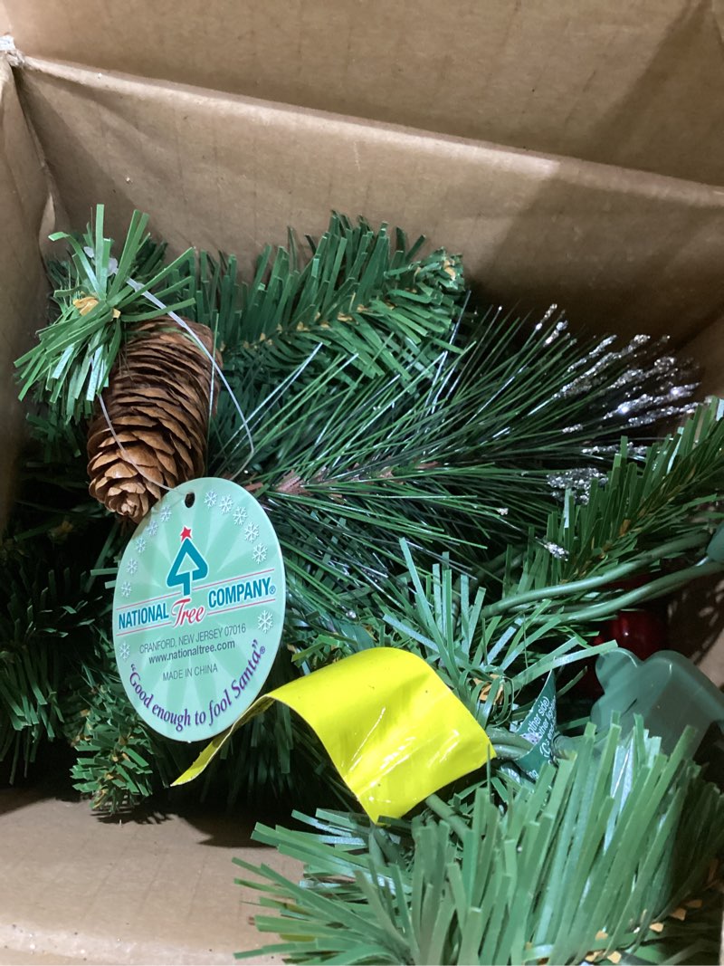 Condition photo showing Good Condition for national tree company 9 ft pre-lit crestwood spruce artificial christmas garland, christmas decoration with glitter, pinecones, red berries, 50 clear lights, 180 tips, green plug in tree
