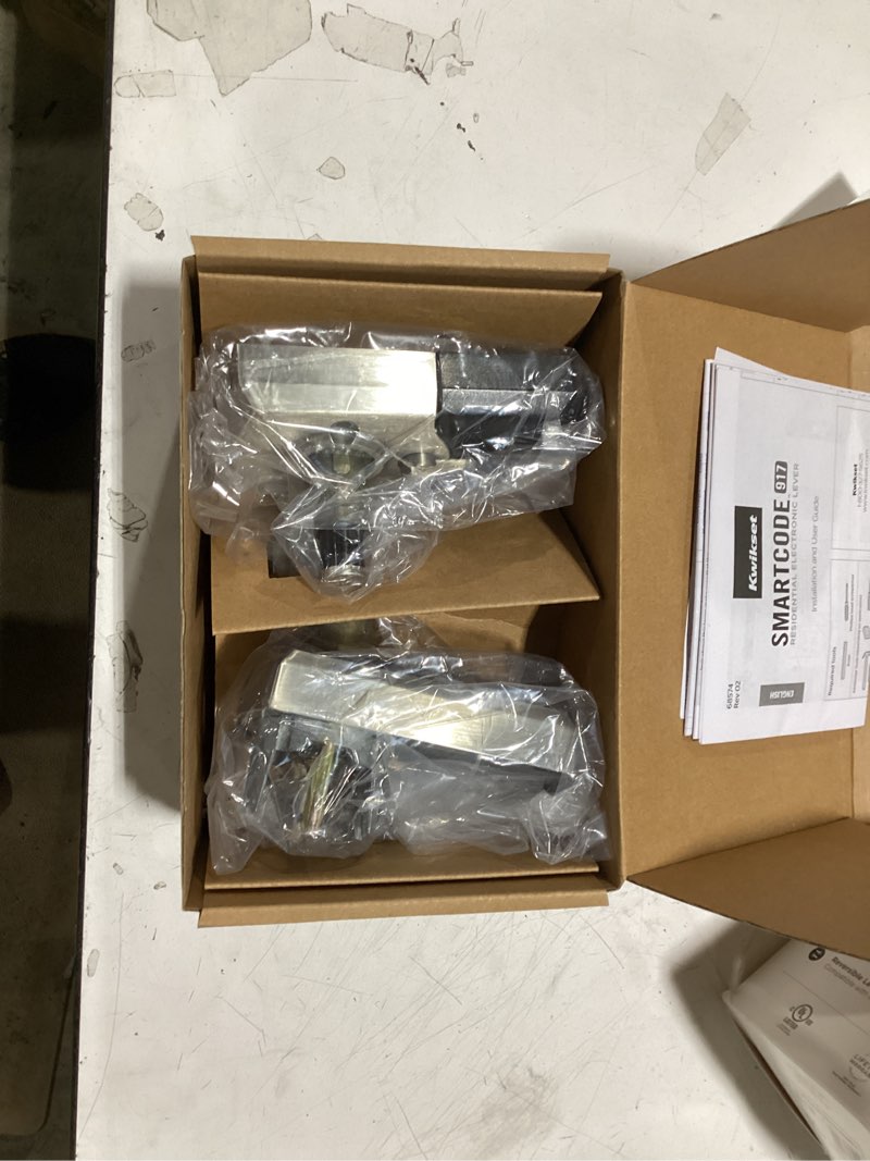 Condition photo showing As Is for kwikset smartcode 917 satin nickel keypad electronic single-cylinder tustin door handle featuring smartkey security