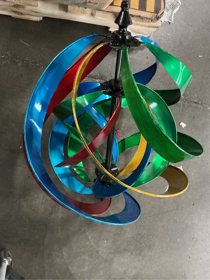 Condition photo showing As Is for member's mark wind spinner
