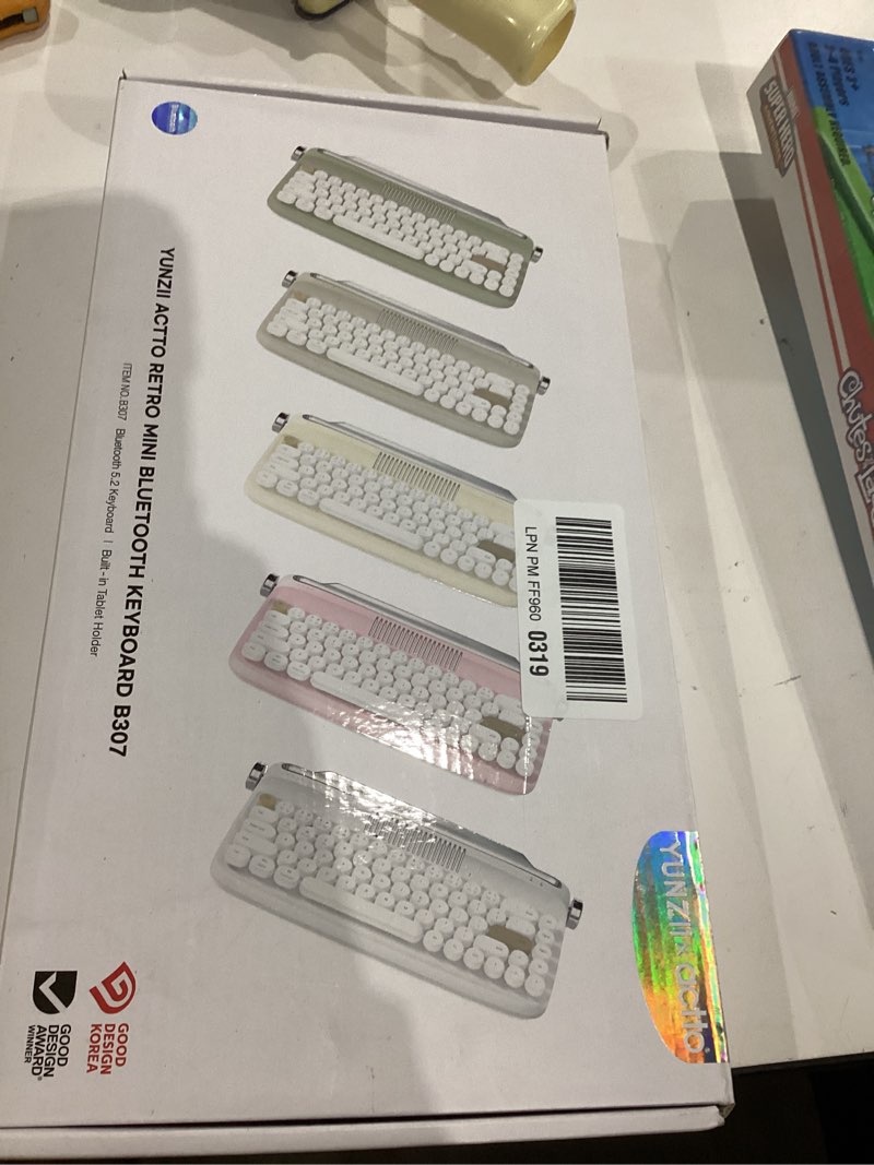 Condition photo showing As Is for YUNZII Upgraded Wireless Typewriter Keyboard, Retro Aesthetic with Integrated Stand,Cute Round Keycaps, USB-C/Bluetooth Connection for Table, Phone, PC and Win/Mac/Android (B307, Baby Pink) B307 Baby Pink