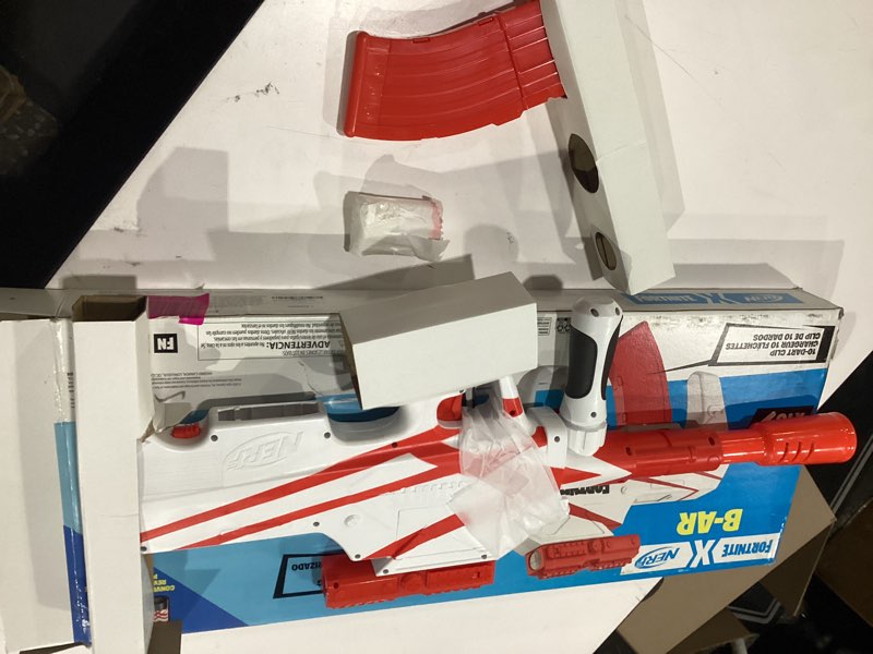 Condition photo showing New/Like New for nerf fortnite b-ar motorized dart blaster - fortnite converge wrap, motorized 10-dart blasting, 10-dart clip, 10 official nerf elite darts standard packaging