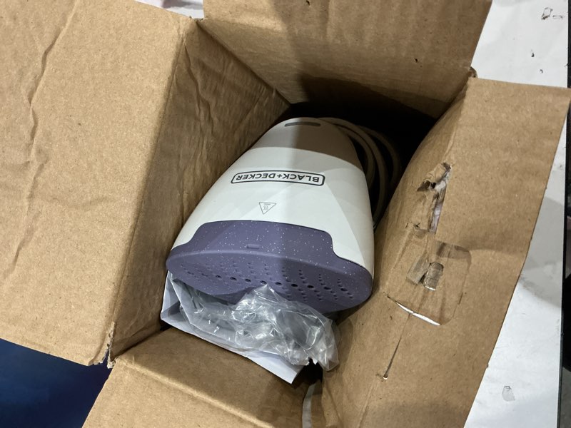 Condition photo showing As Is for black+decker compact handheld garment steamer, 1000w, 30-second heat up, 6-minutes of continous steam, 10.8 fl oz detachable water tank, lavender & white