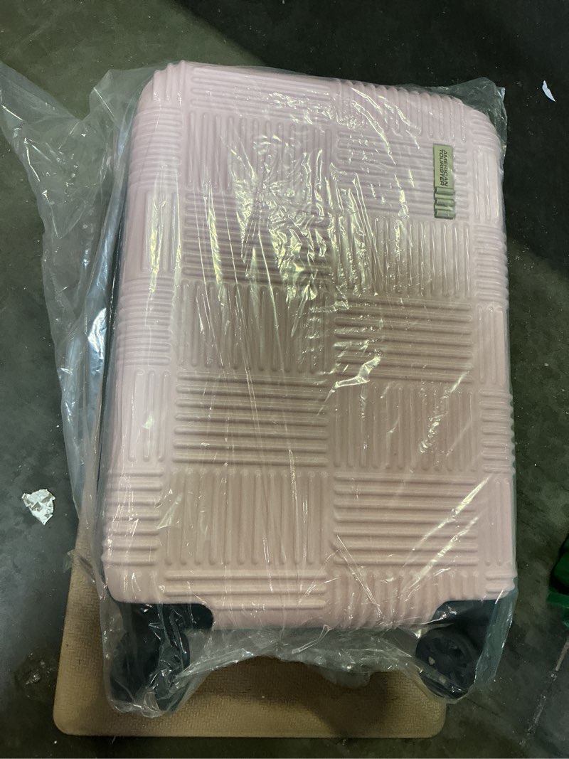 Condition photo showing New/Like New for american tourister nxt checkered hardside carry on spinner suitcase - pink