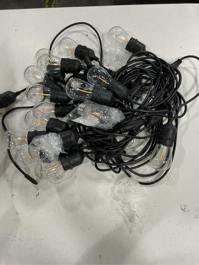 Condition photo showing As Is for harbor breeze 48-ft solar black indoor/outdoor string light with 20 white -light led edison bulbs