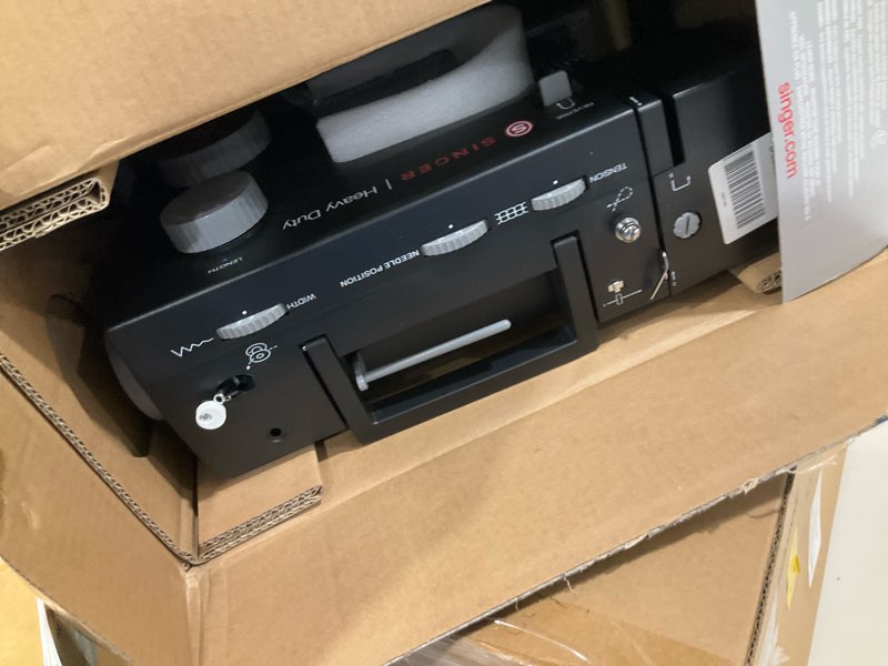 Condition photo showing As Is for SINGER® Sterling Edition Heavy Duty 4432 Sewing Machine with Accessory Kit | Strong Motor with Enhanced Piercing Power, 110 Stitch Applications, Full Metal frame & 1-step Buttonhole