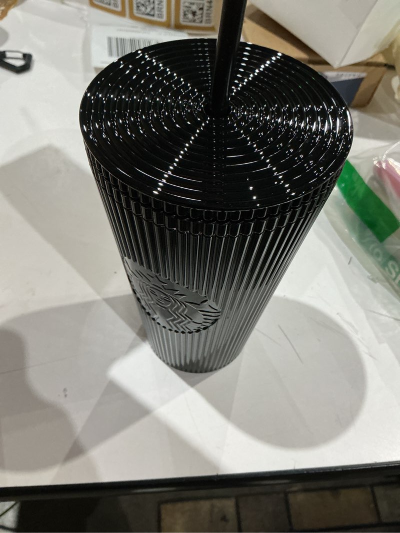 Condition photo showing Good Condition for starbucks shiny black pleated cup winter 2024 16oz cold cup