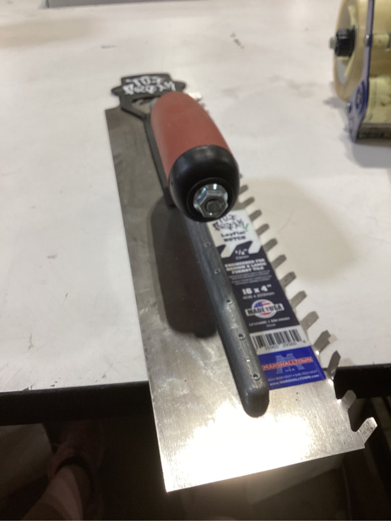 Condition photo showing Good Condition for marshalltown 1/2-in x 1/2-in x 1/2-in ground steel ceramic floor trowel