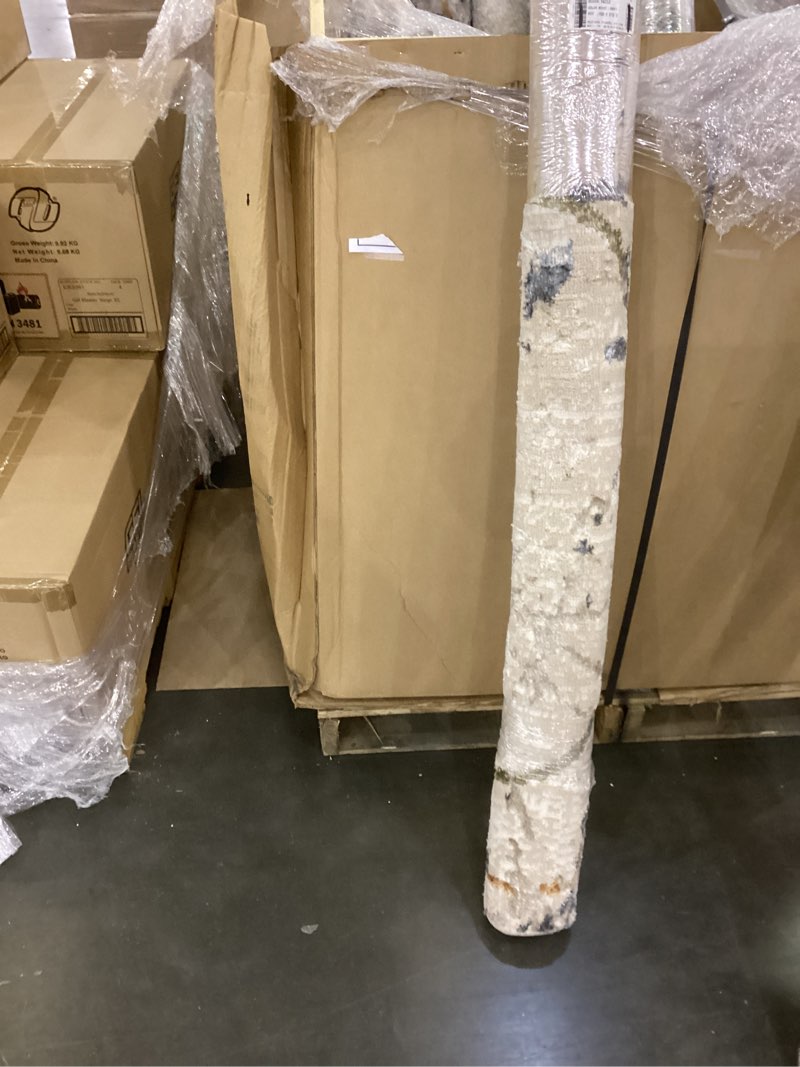 Condition photo showing New/Like New for Pera rug 5x7 beige/ grey