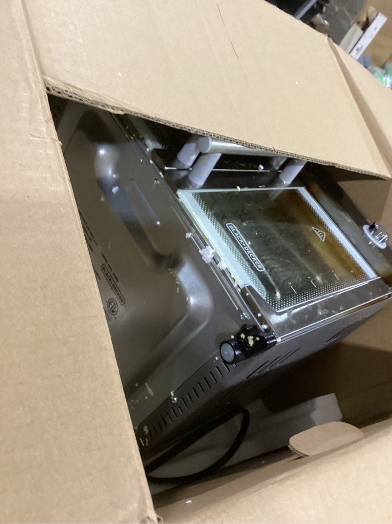 Condition photo showing As Is for BLACK+DECKER Crisp 'N Bake Air Fryer Toaster Oven Combo, 12 in 1 Countertop Convection Oven Cooks Food Fast, Fits a Whole Pizza or 6 Toast Slices, French Doors with Stainless Steel Finish