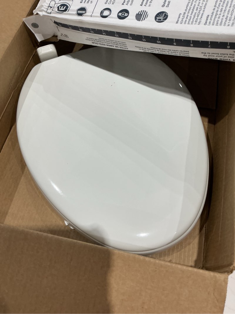 Condition photo showing Good Condition for kohler stonewood quiet-close elongated toilet seat, slow close design, durable wood, easy installation, universal fit, white finish, k-20466-0