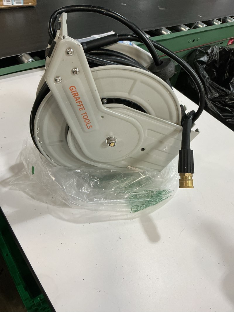 Condition photo showing As Is for giraffe tools pressure washer hose reel 65ft, 3200 psi power washer hose reel, pressure washer retractable hose reel, heavy duty, wall/floor mounted, silver
