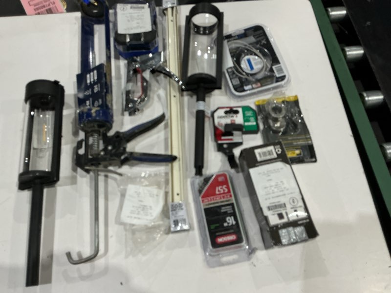 Condition photo showing As Is for assorted home improvement lot (small tools, screw, home accessories, etc )
