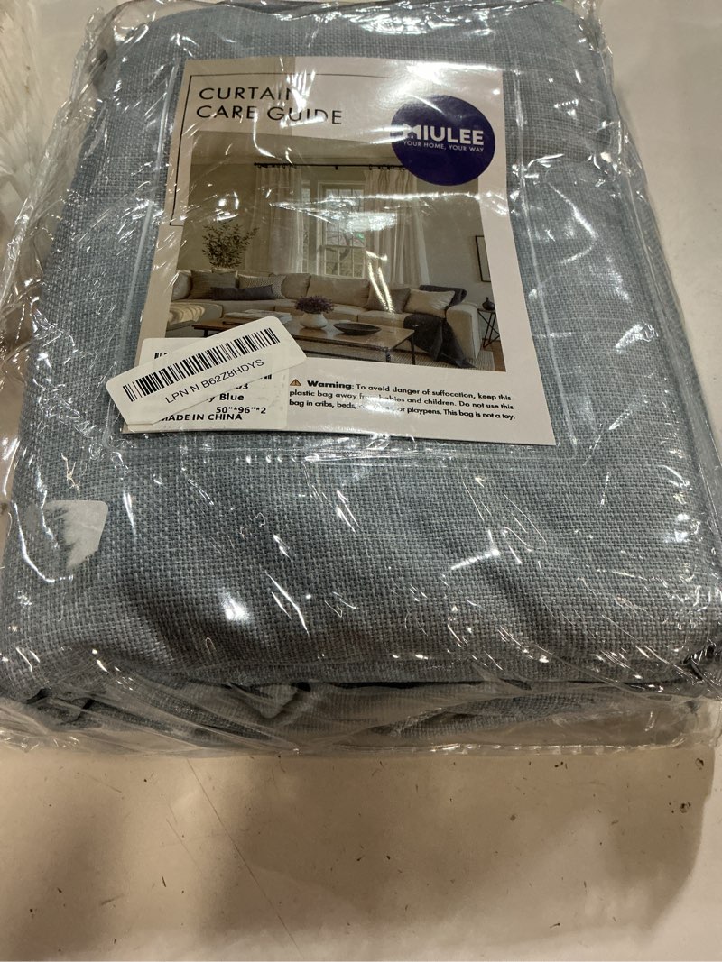 Condition photo showing New/Like New for miulee 100% blackout curtains 96 inch long 2 panels set for bedroom, thick faux linen black out curtain room darkening back tab pleat window textured drapes with hooks for living room, chambray blue chambray blue 50"w x 96"l (pack of 2)